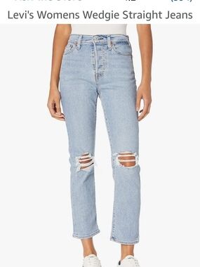 Levi's Women's Light Blue High-Rise Straight Jeans with Knee Rips